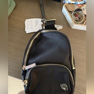lululemon athletica Black Backpack with Gold Accents